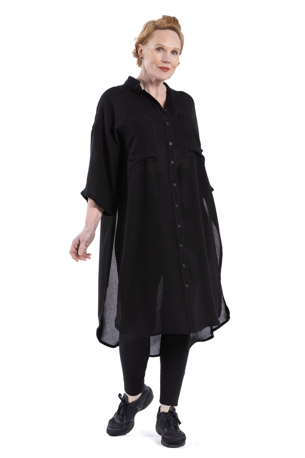 Black oversized short-sleeve shirt dress with grandpa collar and patch pockets.